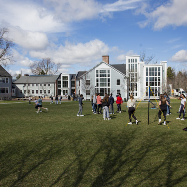 Students playing sports on the quad.