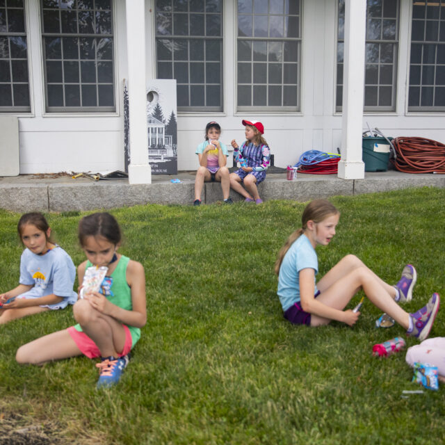 Campers smiling on the quad.