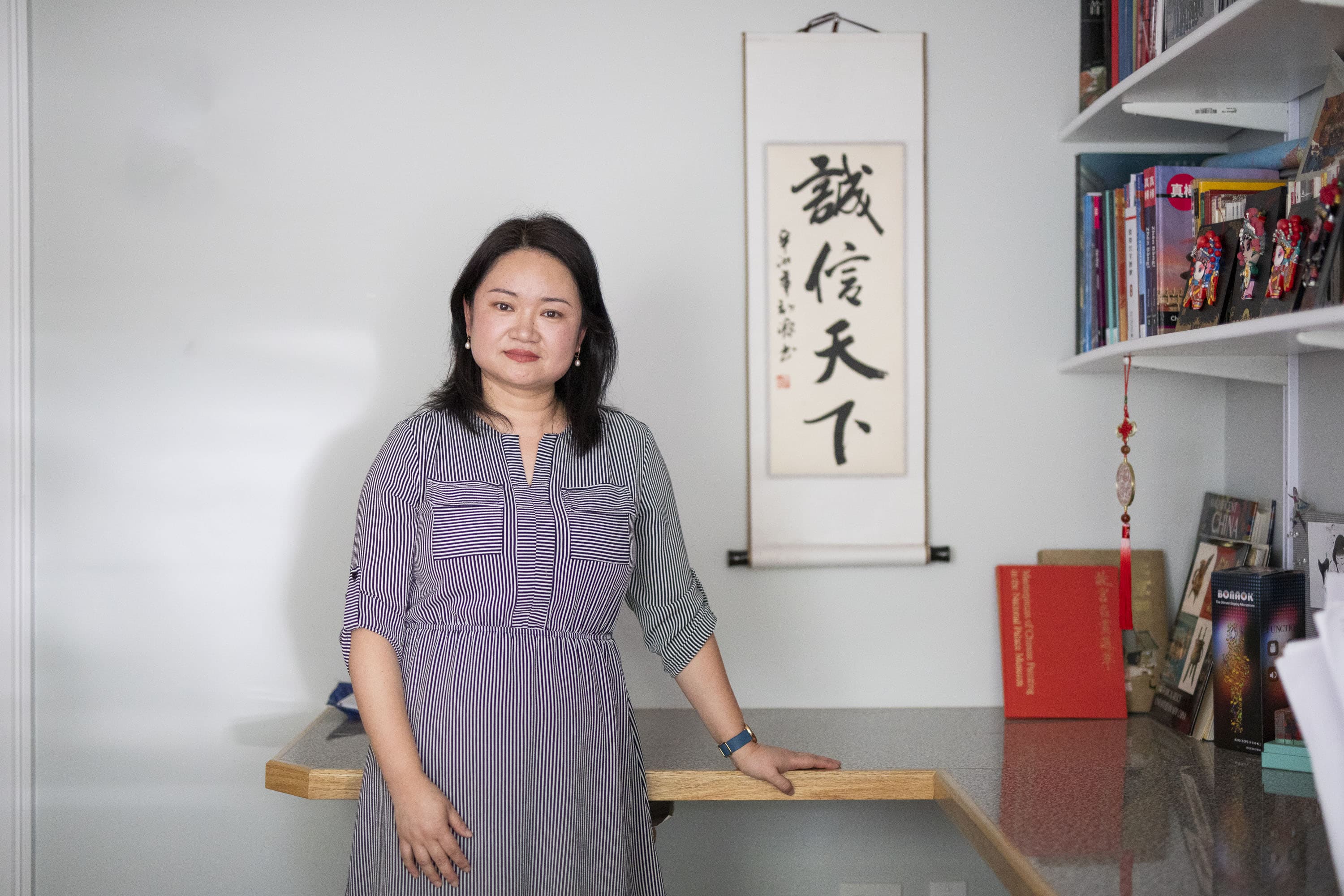 Wenjun Kuai poses for a photo in her office in the Main School Building on Wednesday, May 22, 2024.